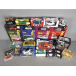 Corgi - Welly - Hachette. Lot of over 20 boxed diecast vehicles in various scales.