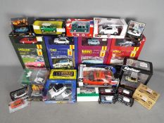 Corgi - Welly - Hachette. Lot of over 20 boxed diecast vehicles in various scales.