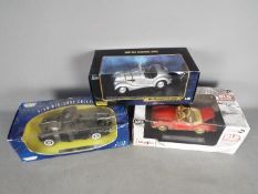 Ricko, Motor Max, Maisto - Three boxed 1:18 scale diecast model cars.