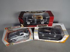 Road Signature, Maisto, Burago - Three boxed 1:18 scale diecast model cars.