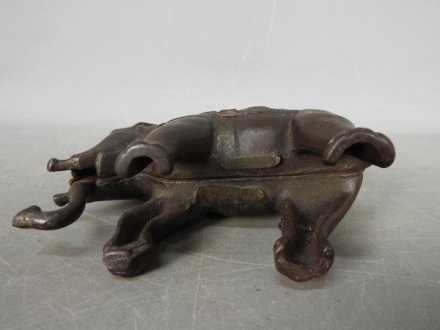 A vintage, cast iron, money bank in the form of an elephant, - Image 5 of 5