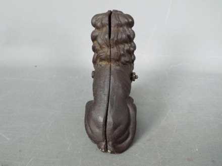 A cast iron money bank in the form of a seated male lion, - Image 5 of 5