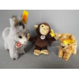 Steiff - three Steiff animals to include a Monkey #112119, a cat #112089 and a donkey #052866,