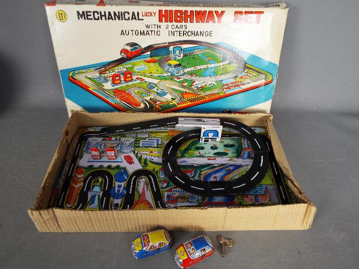 LTI Lucky Toys, Other - Two boxed tinplate toys. - Image 2 of 3