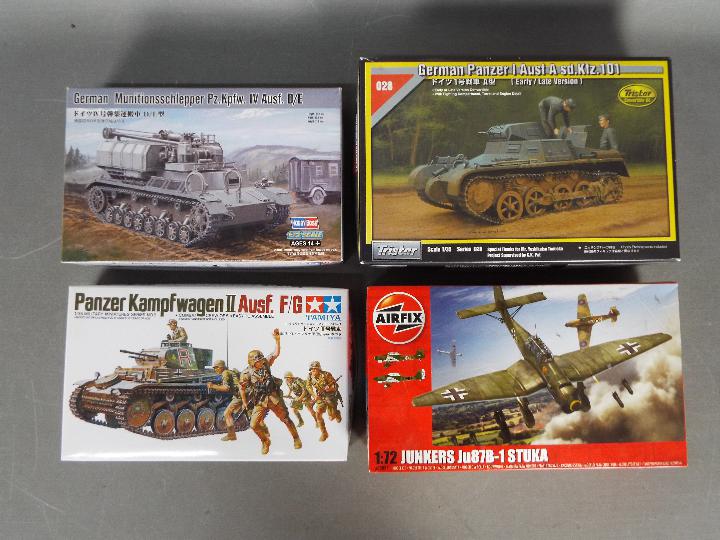 Airfix, Tamiya, Trister, Hobby Boss - A collection of four plastic model kits in various scales.