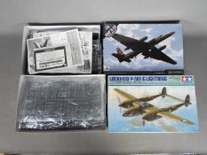 Academy, Tamiya - Two boxed 1:48 scale plastic military aircraft model kits.