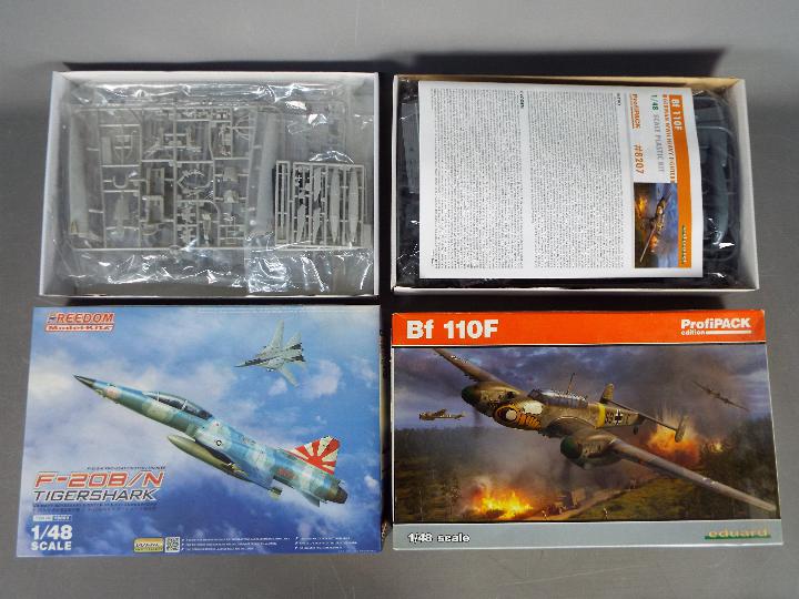 Freedom Model Kits, Eduard - Two boxed 1:48 scale military aircraft plastic model kits.