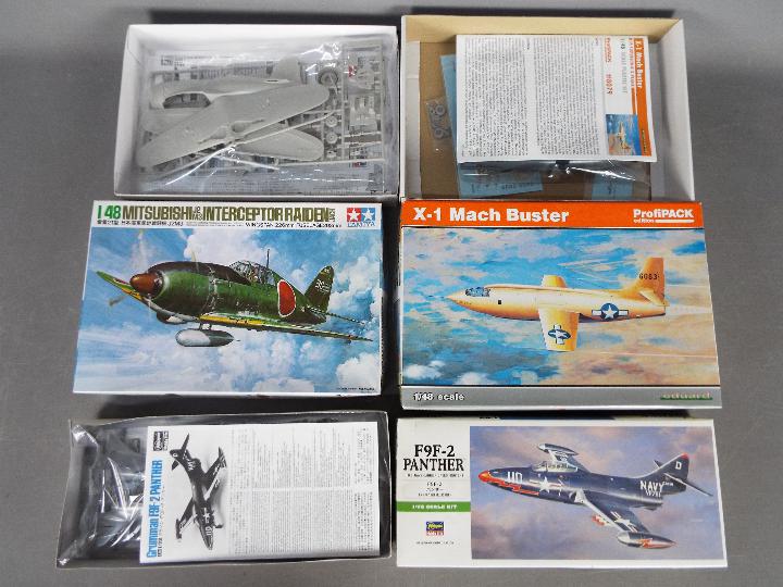 Three Boxed plastic military aircraft model kits. Lot includes Hasegawa - F9F-2 Panther U.