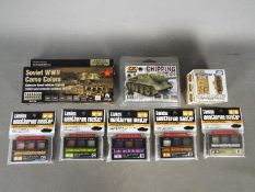 Tamiya, Mr.Hobby, AK Interactive, Vallejo - A collection of eight model paint sets.