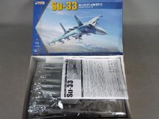 Kinetic Model Kits - A boxed 1:48 scale K48062 SU-33 Flanker D model aircraft kit by Kinetic Model