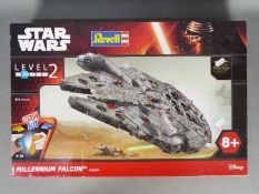 Revell, Star Wars - A boxed Revell Level 2 Star Wars #06694 Millennium Falcon plastic model kit.