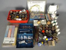 Humbrol, Tamiya, Vallejo, Others - An modelers air brush with over 30 model paints,