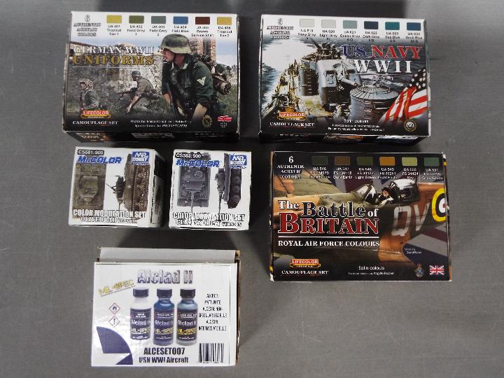 Lifecolor, Hataka, Mr.Hobby, Alclad - A collection of six model paint sets.