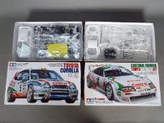 Tamiya - Two boxed 1:24 scale plastic model cars by Tmiya.