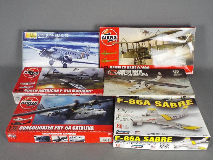 Airfix, Heller, Lindberg - A boxed grouping of plastic model kits in various scales.