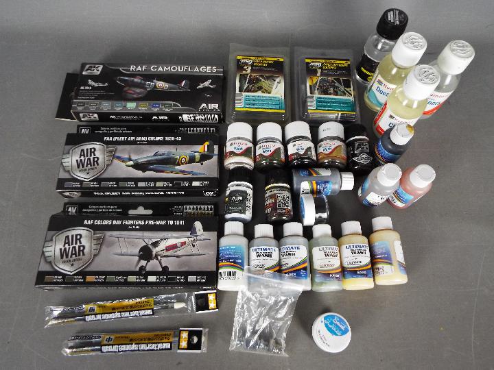 Ammo, Vallejo, Ultimate Modellers Products - A collection of model paints.