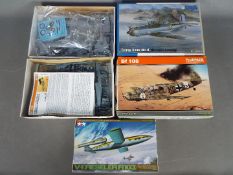 Three boxed 1:48 scale plastic model kits.