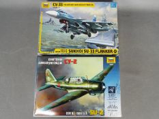 Zvezda - Two boxed plastic military aircraft model kits by Zvezda.