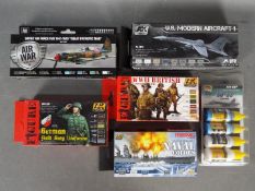 AK Interactive, Vallejo Ammo - A collection of six model paint sets.