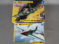 Zvezda - Two boxed plastic military aircraft model kits by Zvezda.
