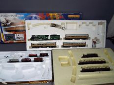 Hornby, Mainline, Airfix - Three incomplete boxed OO model railway sets.