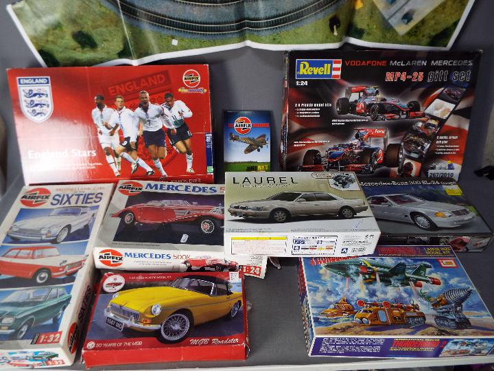 Airfix - Revell - A collection of 8 model kits including Aoshima Nissan Laurel,