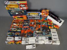 Matchbox - Over 50 boxed / carded Matchbox diecast model vehicles.