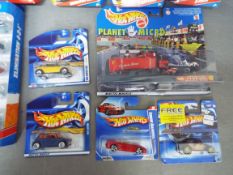 Hot Wheels - A collection of 8 Hot Wheels gift packs along with 4 single carded models,