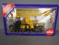 Siku - A boxed Siku #4310 1:55 scale Latticed Mast Crane.