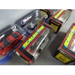 Scalextric - A collection of 6 Scalextric cars and a boxed set of trackside figures.
