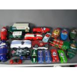Marks And Spencer - A collection of 21 transportation themed biscuit tins including vintage racing