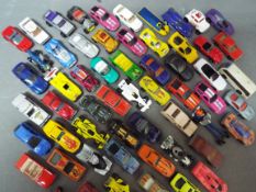 Hot Wheels - A collection of over 50 loose Hot Wheels cars including VW Baja Bug, Ford Mustang,