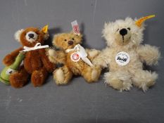 Steiff - three Steiff Bears to include #669699 with button and white label,
