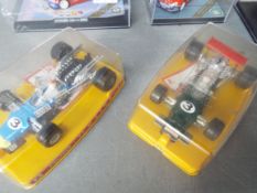 Vitesse - Trofeu - Politoys - A collection of 14 boxed racing cars in various scales including