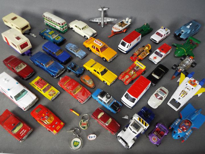 Corgi - Dinky - Matchbox - A lot of over 30 loose diecast vehicles in various scales including