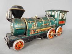 Modern Toys - An unboxed Japanese Modern Toys tin plate battery operated Western Locomotive.
