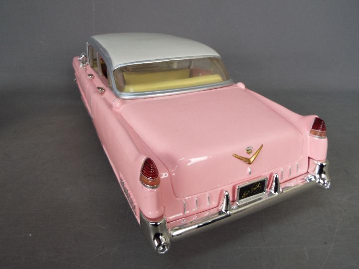 The Bradford Exchange - A limited edition cast resin 1:12 scale Elvis Presley 1955 pink Cadillac - Image 5 of 6