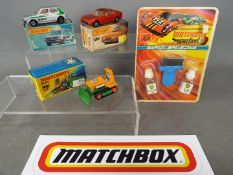 Matchbox - 3 boxed Matchbox vehicles and a Superfast Tune Up kit.