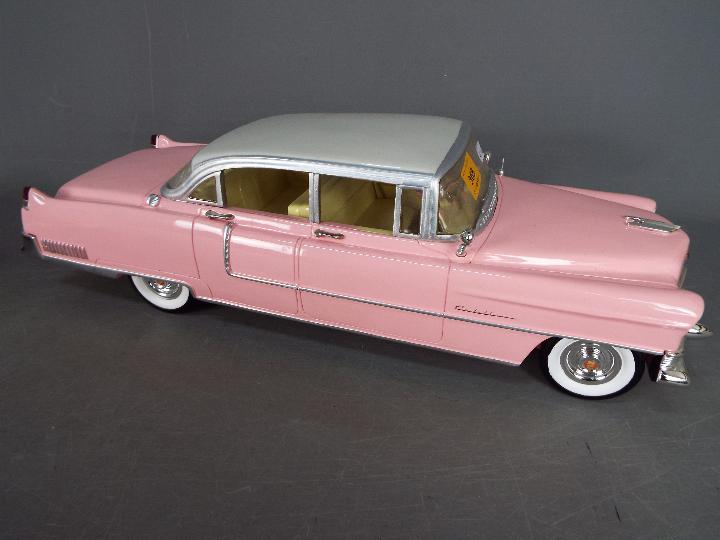 The Bradford Exchange - A limited edition cast resin 1:12 scale Elvis Presley 1955 pink Cadillac - Image 3 of 6