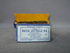 Hornby Dublo - A boxed Hornby Dublo 3-Rail EDLT20 4-6-0 Steam Locomotive and Tender Op.No.