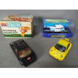 Scalextric - Lot of 4 Scalextric items including boxed # C3213 Morris Mini Police panda car,