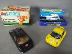 Scalextric - Lot of 4 Scalextric items including boxed # C3213 Morris Mini Police panda car,