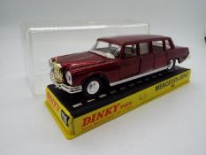 Dinky Toys - A boxed Dinky Toys #128 Mercedes Benz 600.
