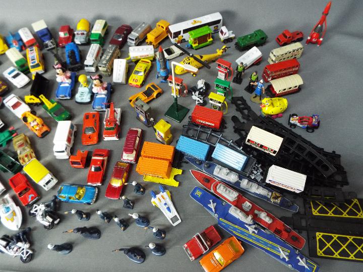 Matchbox - Corgi - Majorette - A collection of over 60 loose diecast vehicles and accessories in - Image 3 of 4