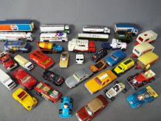 Matchbox - Corgi - Bburago - A lot of over 30 loose diecast vehicles in various scales including