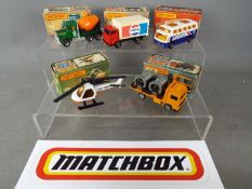 Matchbox - A collection of 5 boxed Matchbox vehicles including # 19 Peterbilt Cement Truck,