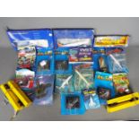 Ertl, Others - A collection of diecast carded vehicles,