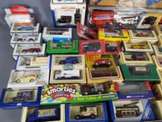 Lledo - A collection of over 50 boxed Lledo models and several additional unboxed models and some