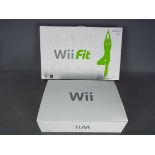 Nintendo - Wii - Boxed Nintendo Wii and boxed Wii Fit, show signs of use,