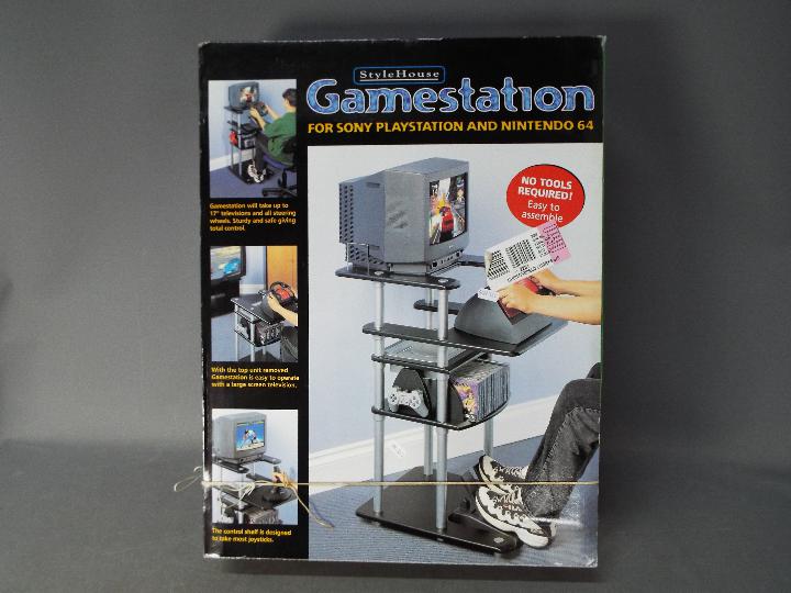 Stylehouse - Boxed stand for Sony Play Station and Nintendo 64 gaming systems.